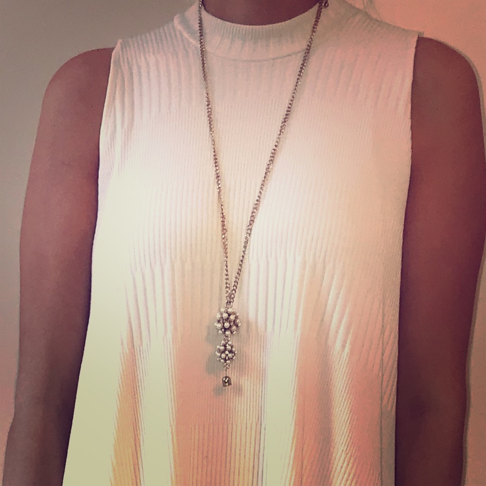 Long gold and pearl necklace